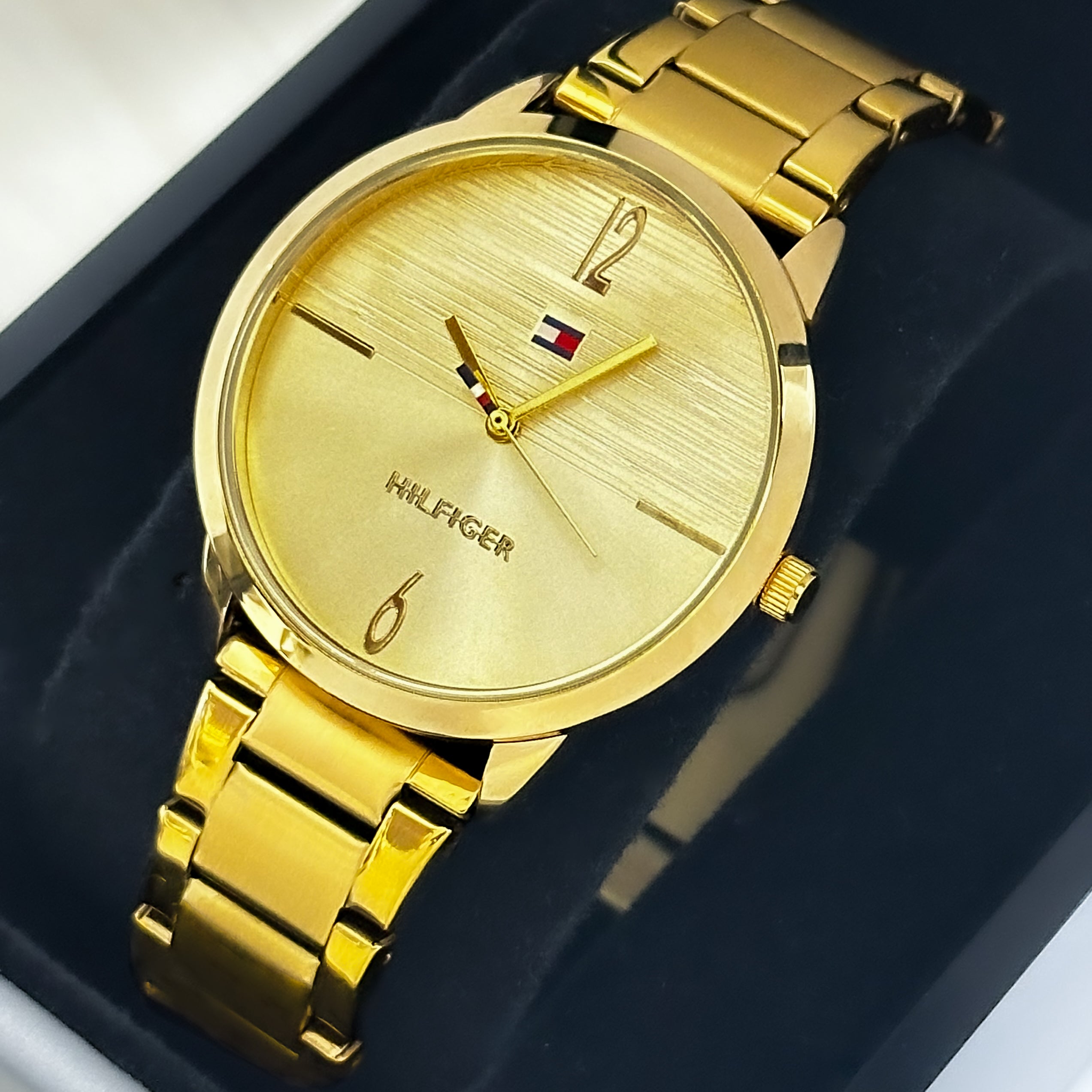 RELOJ TH DAMA METALICO