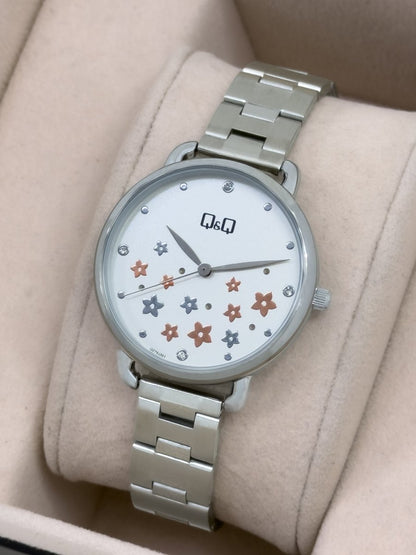 Reloj Q&Q Jardín Metálico - Relojes 24K