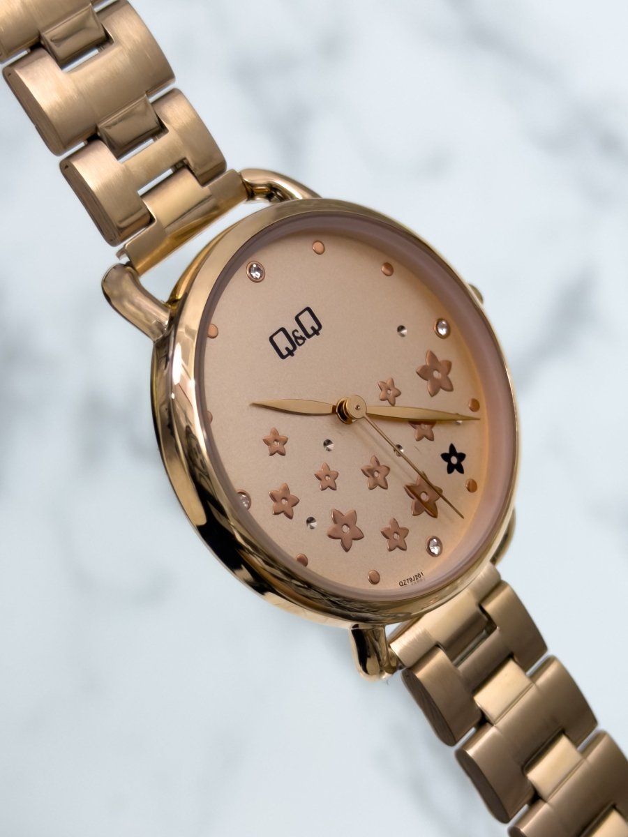 Reloj Q&Q Jardín Metálico - Relojes 24K